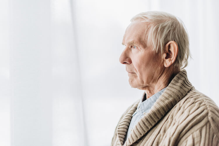 Portrait of a senior afflicted with seasonal affective disorder.