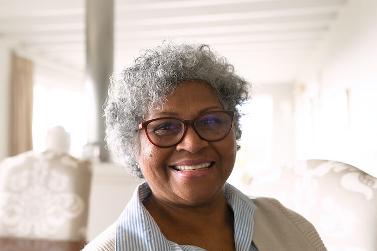 Senior woman happy about making the move to senior living.