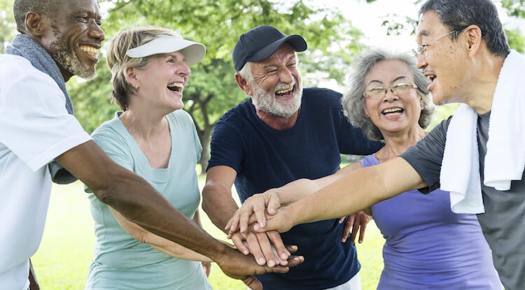 Group of seniors exercising together. 