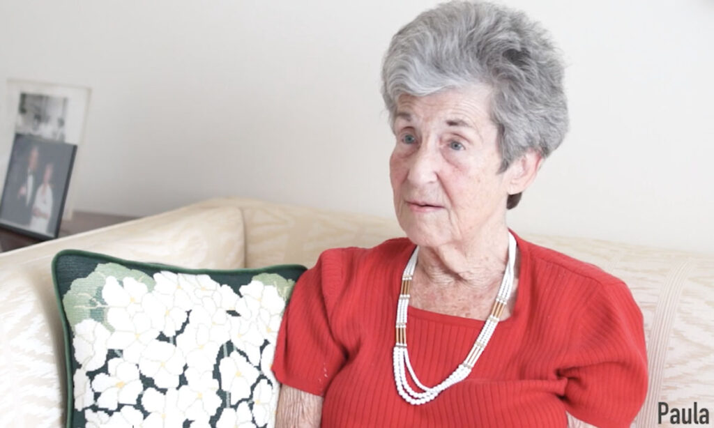 senior woman in red blouse