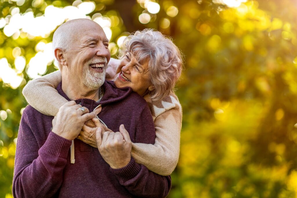 Seniors hugging