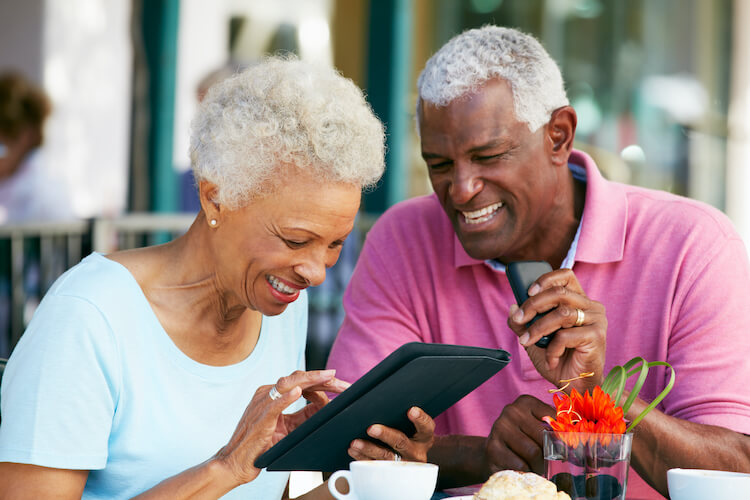 Senior couple using a tablet.