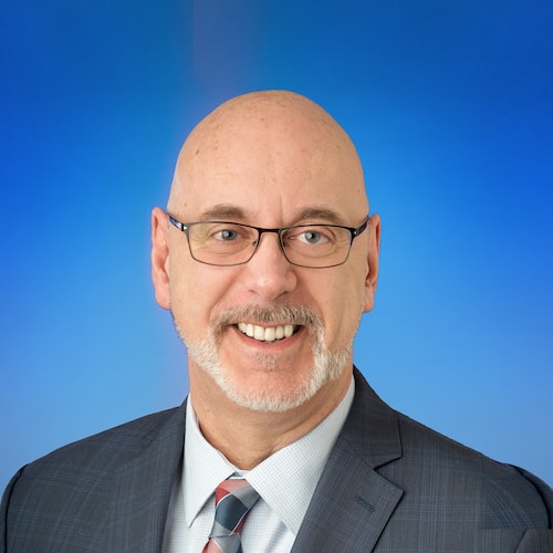 John A. Harz, Senior VP of HR