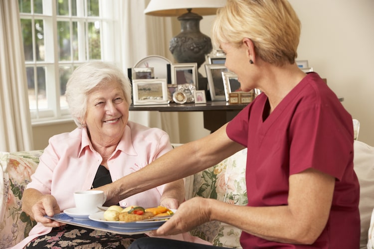 Happy senior woman enjoying life in an assisted living community