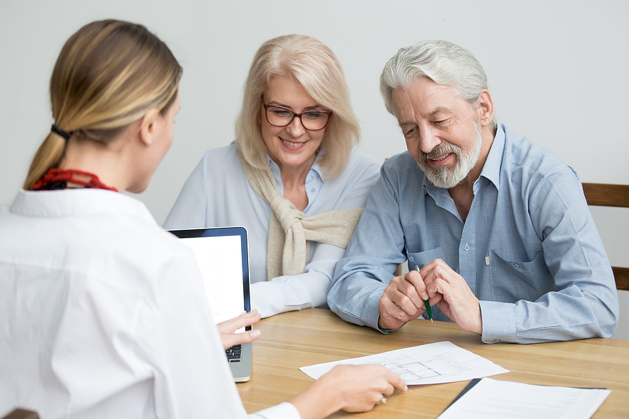 Older man and woman discussing living options