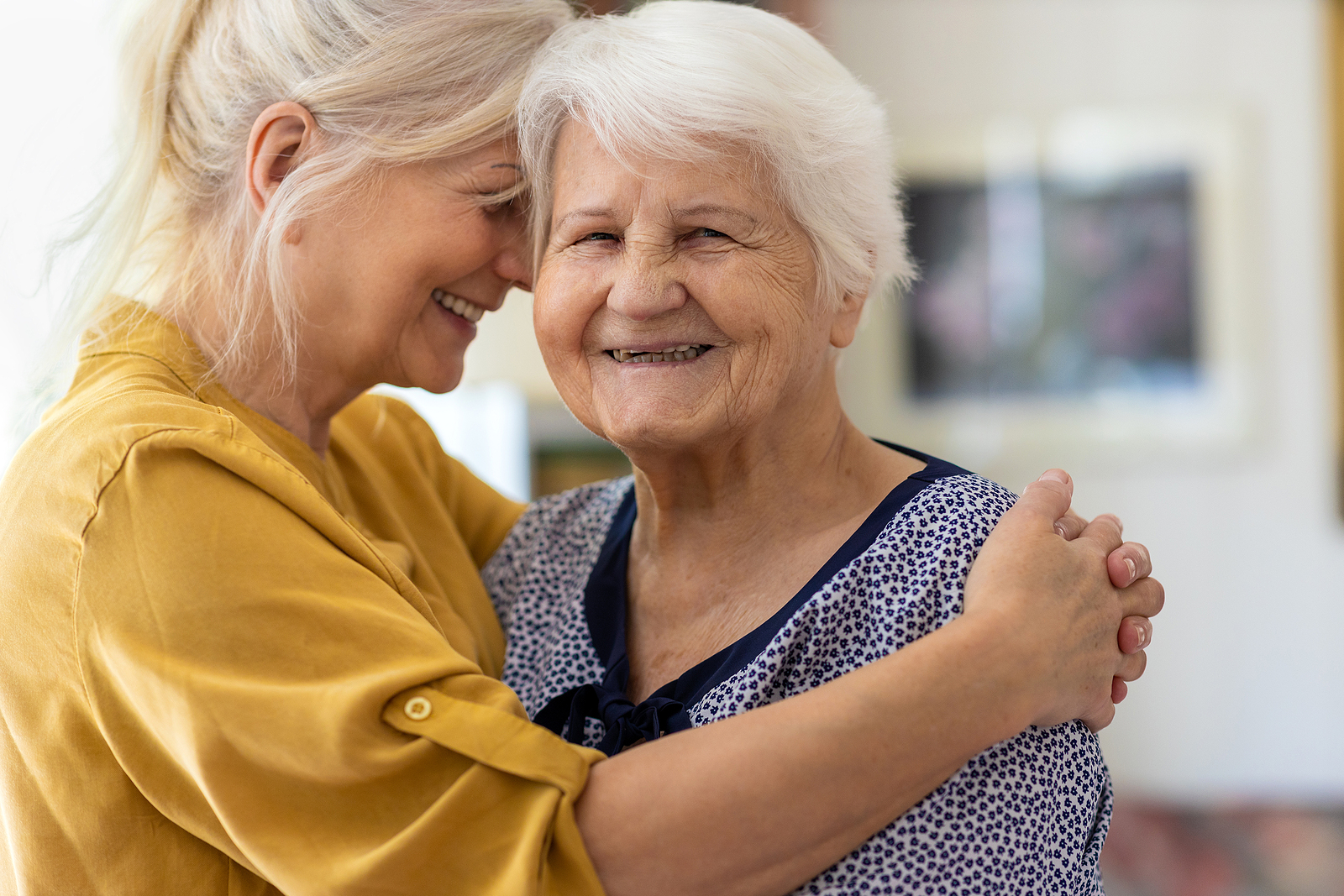Mother’s Day Woman spending time with her elderly mother